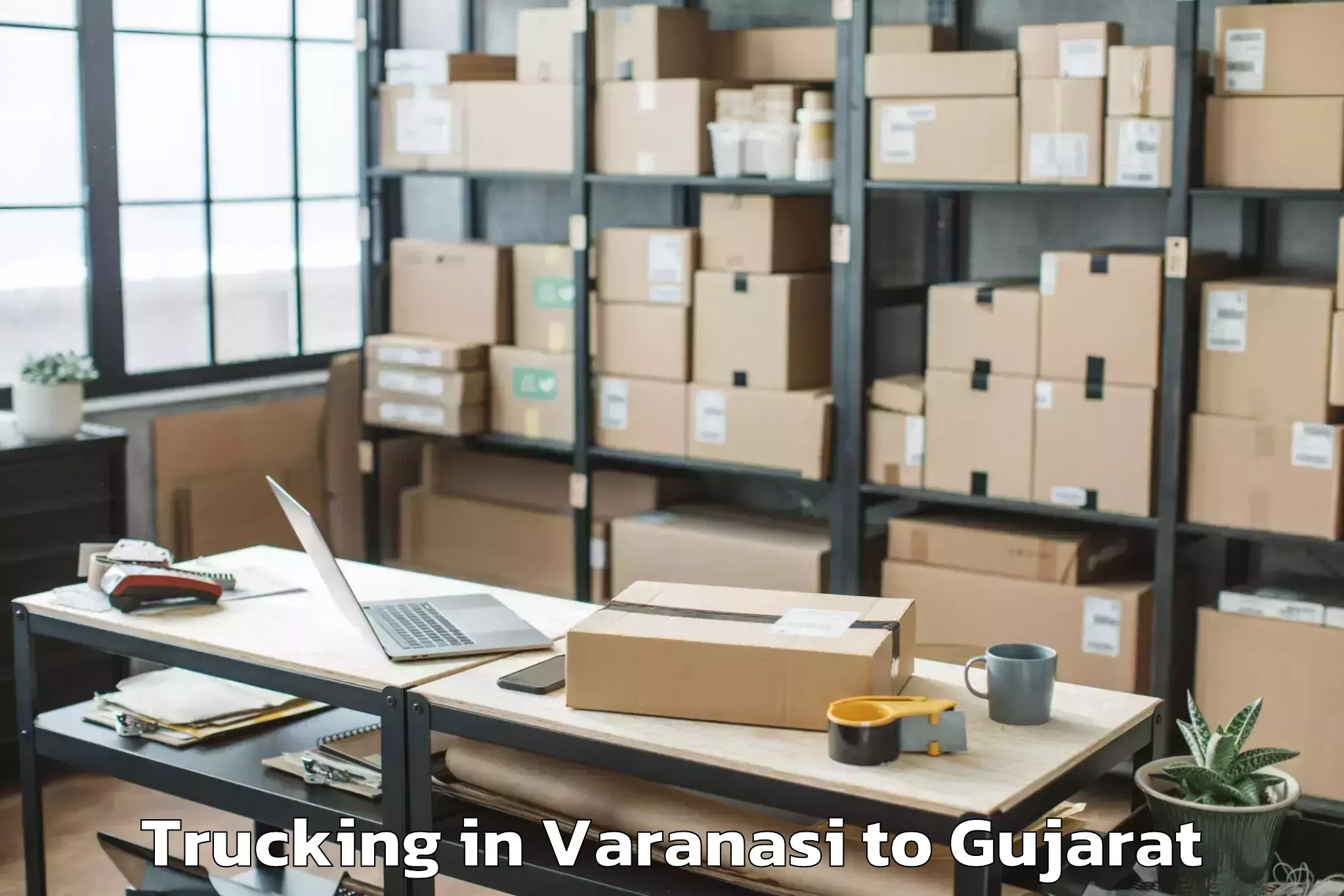 Book Varanasi to Childrens University Gandhinag Trucking Online